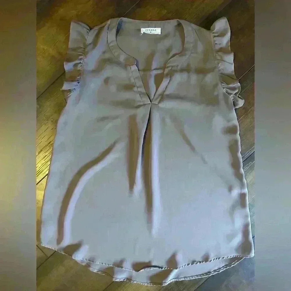 Zenana women’s size medium light brown blouse. Ruffle sleeves